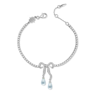 ALICE｜Blue Topaz & Pearl Silver Bow Tennis Bracelet